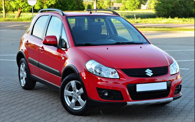 Suzuki SX4 cena 31900 przebieg: 93865, rok produkcji 2013 z Piastów małe 562
